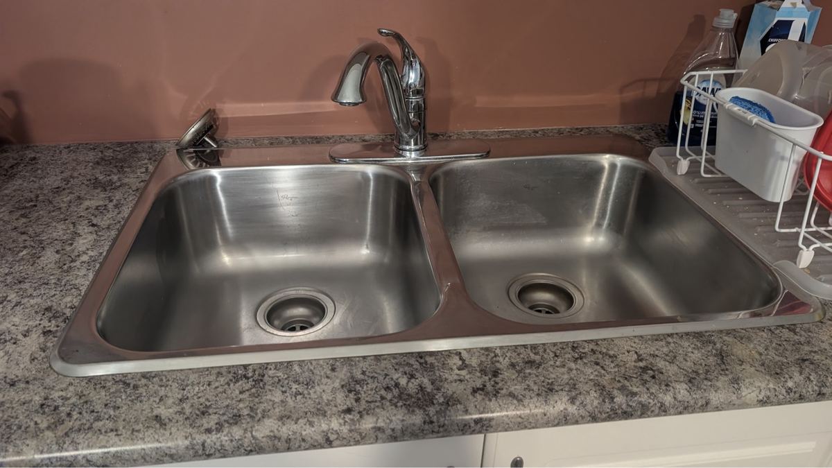 Kitchen sink area after a Cozy & Clean deep clean